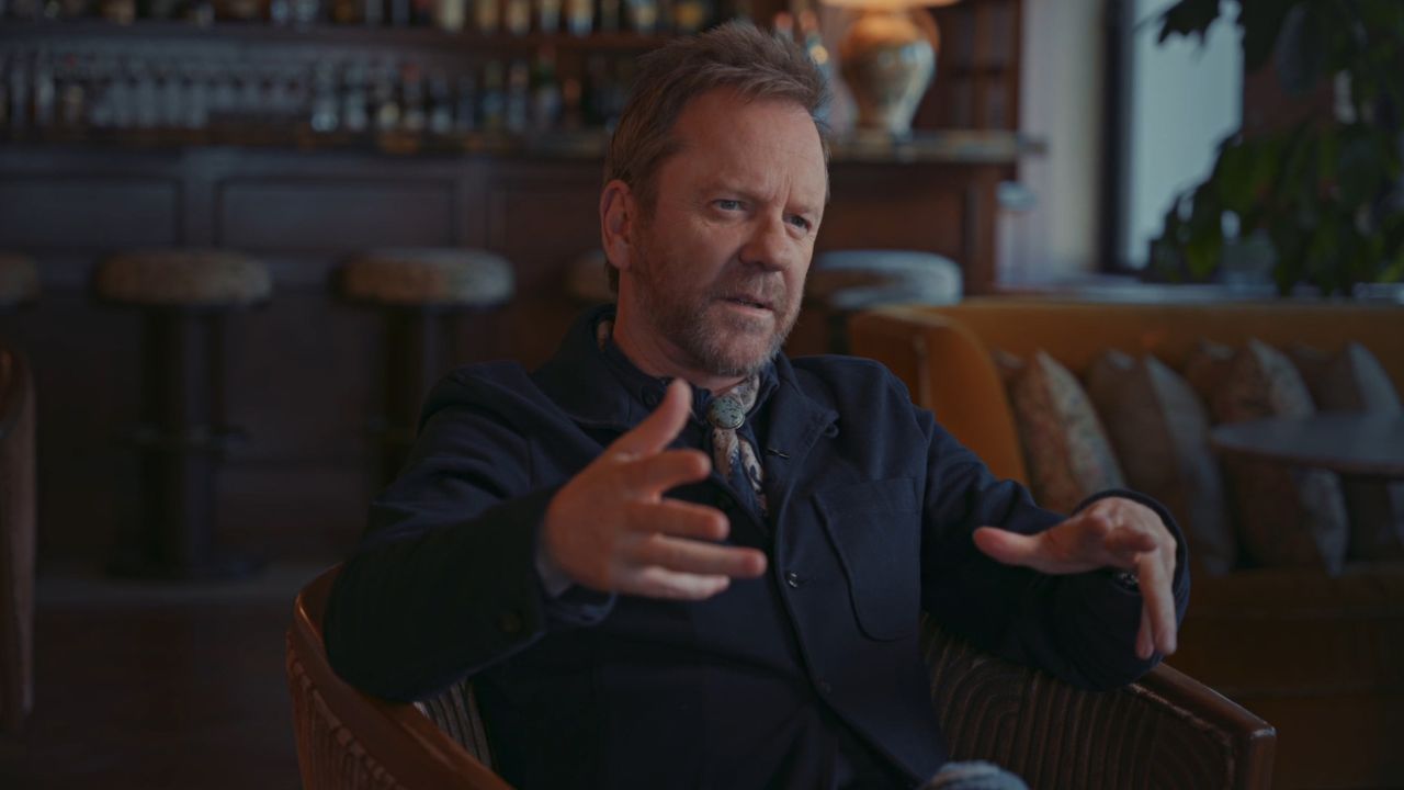 Keifer Sutherland at a bar talking